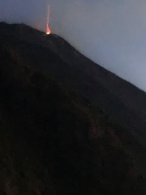 "A group of us (the Georgia Peaches) climbed high on the island of Stromboli, Sicily," wrote  Virginia Pasquarelli. "We got lots of shots of fire and smoke erupting from the volcano, but this one, with its single flame rising into the night sky is my favorite."