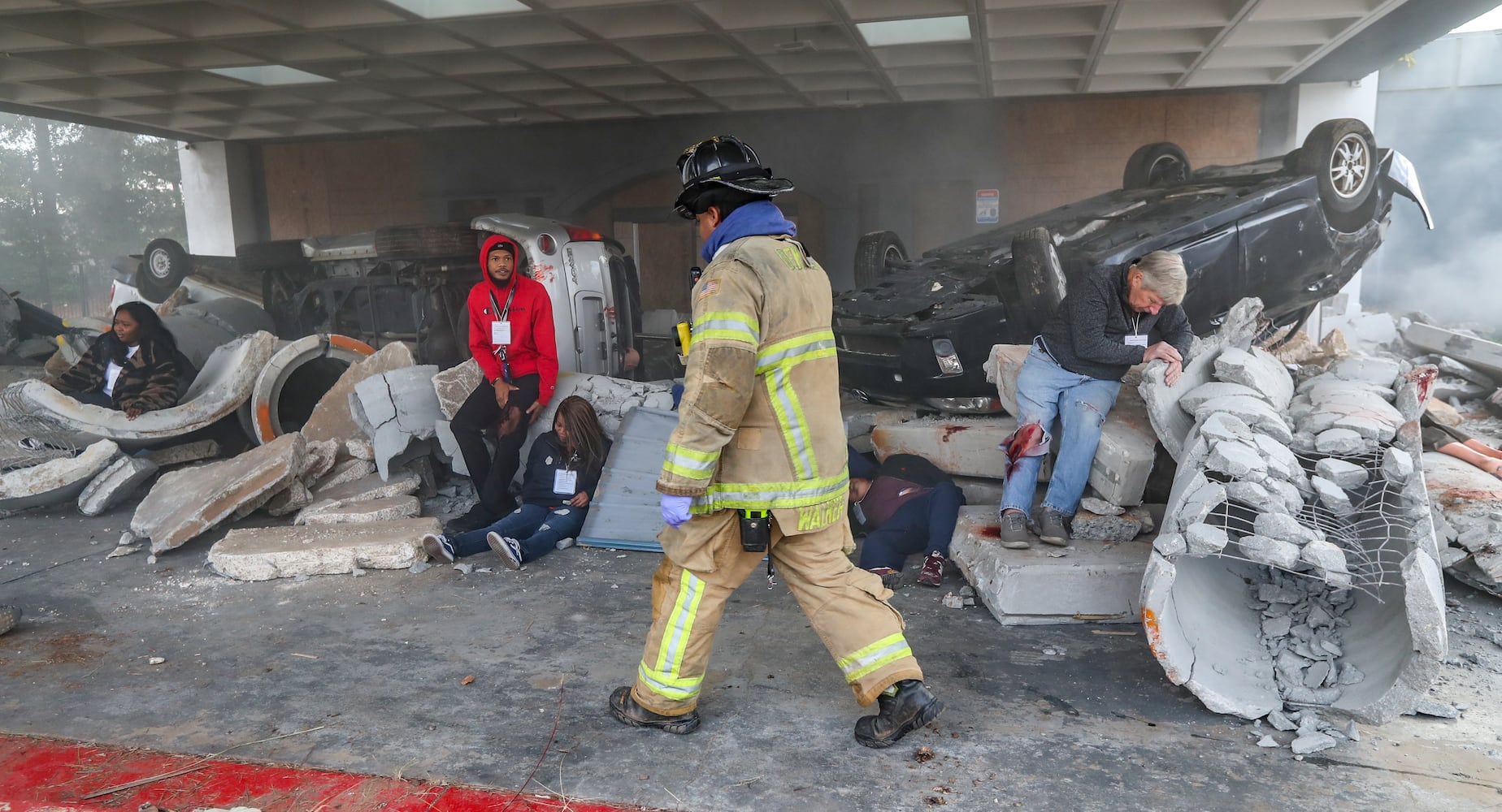 Firefighters from several metro jurisdictions participate in  the Atlanta Regional Commission’s Homeland Security & Emergency Preparedness Department's first-ever Atlanta Regional Full-Scale Emergency Training Exercise on Thursday, Oct. 19, 2023.  (John Spink / John.Spink@ajc.com) 