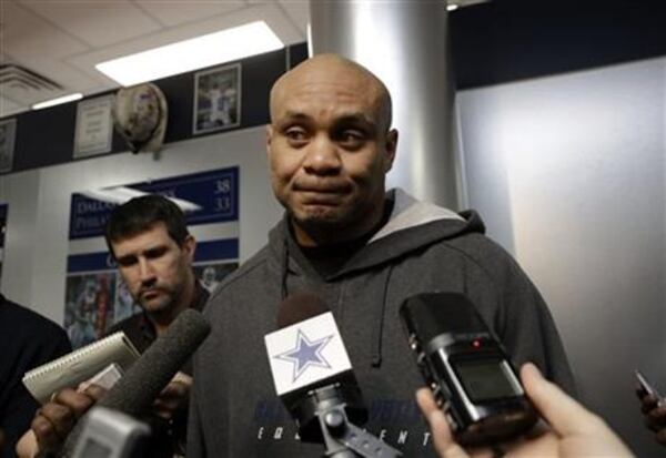 FILE - This is a Feb. 14, 2013, file photo showing Dallas Cowboys secondary coach Jerome Henderson taking a question from reporters during an NFL news conference at the Cowboys training facility in Irving, Texas. T (AP Photo/Tony Gutierrez, File)