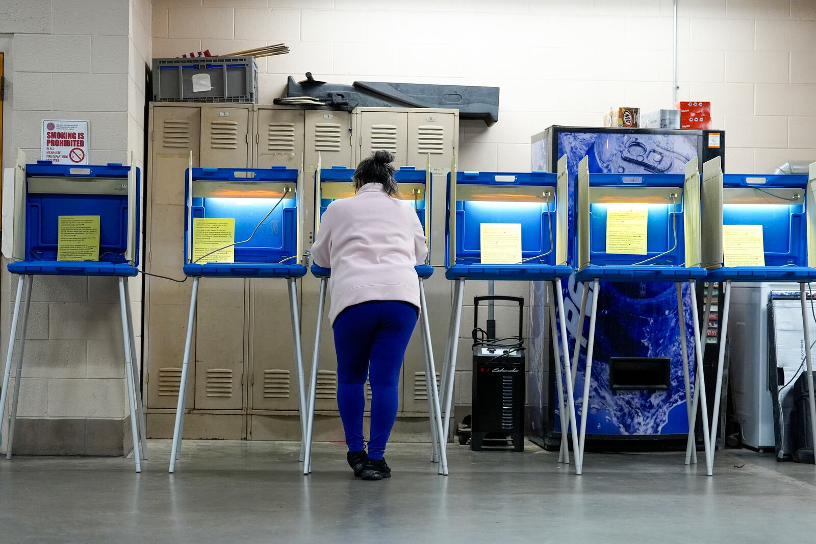 FILE - A voter casts her ballot, April 2, 2024, in Milwaukee, Wis. (AP Photo/Morry Gash, File)