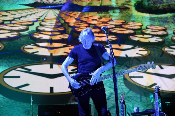  Waters gets busy on the bass during "Time." Photo: Robb Cohen Photography & Video /RobbsPhotos.com