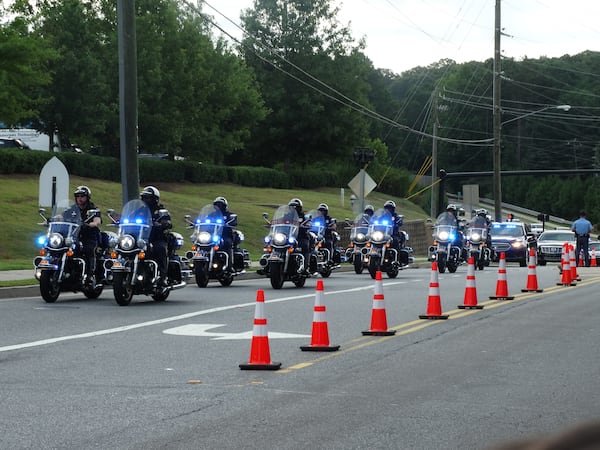 The cops who led the motorcade of close family members entering the St. James United Methodist Church this morning for Bobbi Kristina's funeral. CREDIT: Rodney Ho/rho@ajc.com