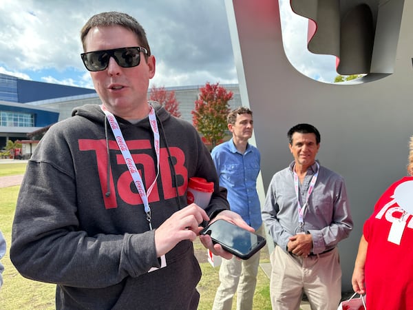 Adam Burbach, a 41-year-old Nebraskan who spearheaded the Save TaB group, at the World of Coke with a group of his TaB buddies on Oct. 20, 2023. RODNEY HO/rho@ajc.com