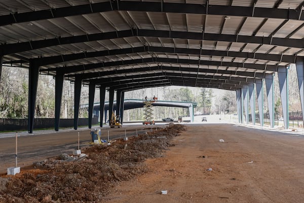 Construction of Peachy Airport Parking's new covered parking facility continues on Wednesday, March 13, 2024. The new lot is set to open by the end of this month with more than 1,000 spaces. (Natrice Miller/ Natrice.miller@ajc.com)