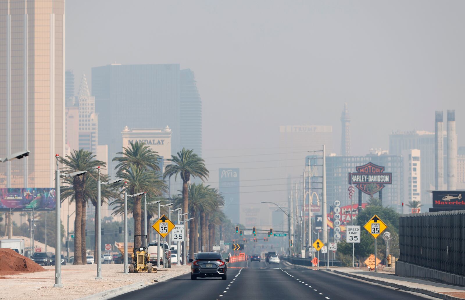 Smoke from California wildfires obscures the view of casinos northbound on the Las Vegas Strip in Las Vegas, Nev., Wednesday, Sept. 11, 2024. (Steve Marcus/Las Vegas Sun via AP)