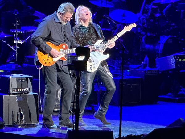 Joe Walsh (right) gigs with Vince Gill during 'Funk #49" during the Eagles concert at State Farm Arena Nov. 4, 2023. RODNEY HO/rho@ajc.com