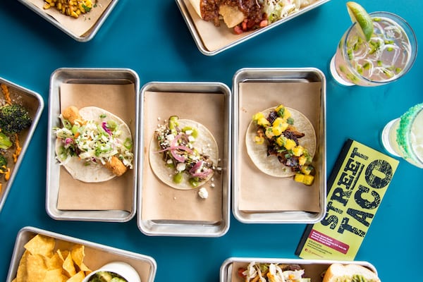 You can find the Baja Fish Taco, Smoked Brisket Taco, Al Pastor Taco and Fitti cocktail at Marietta Street Market’s Street Taco, which has its own dining room. CONTRIBUTED BY MIA YAKEL