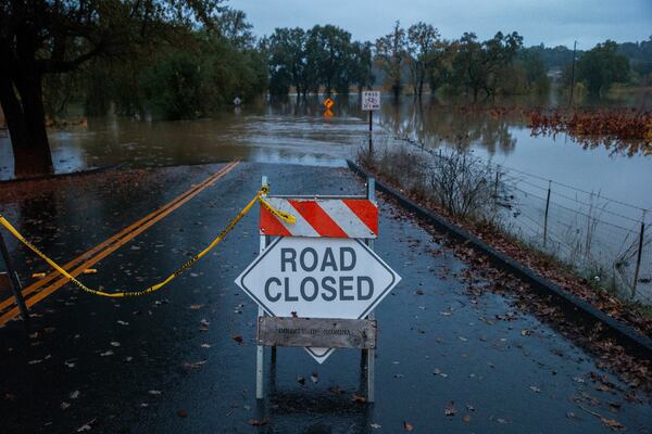 Wohler Road off River Road is closed off as the Russian River floods in Sonoma County, Calif., on Friday, Nov. 22, 2024. (Santiago Mejia/San Francisco Chronicle via AP)