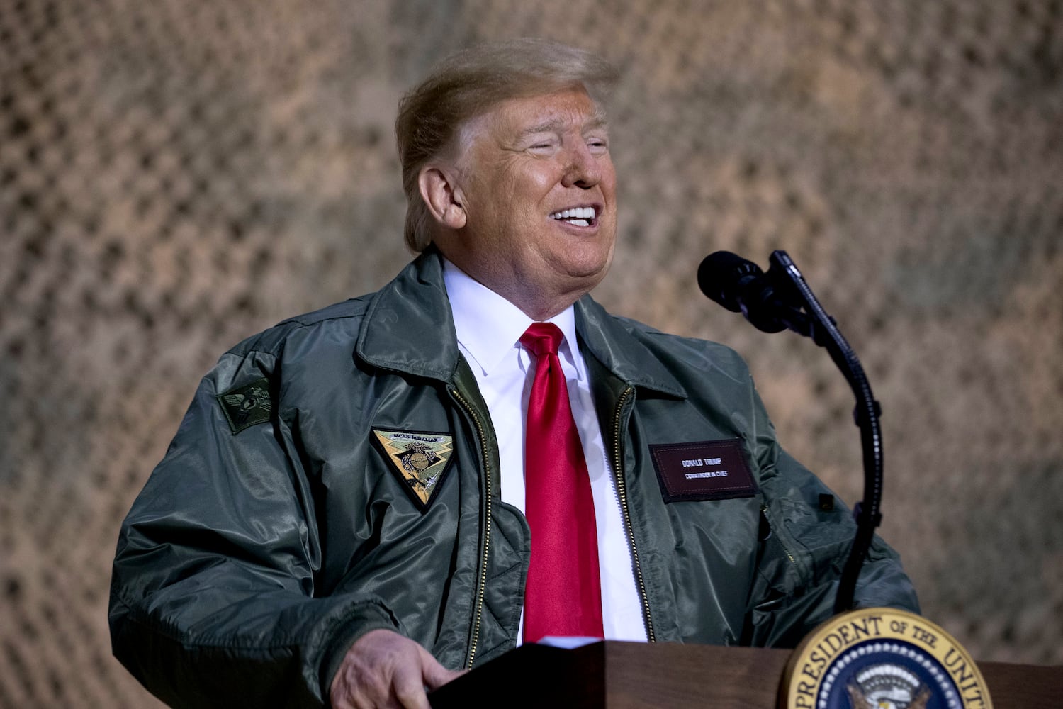 Trump makes unannounced visit to troops in Iraq