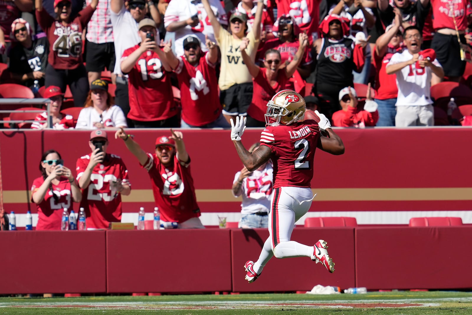 San Francisco 49ers' Deommodore Lenoir (2) returns a blocked field goal for a touchdown during the first half of an NFL football game against the Arizona Cardinals in Santa Clara, Calif., Sunday, Oct. 6, 2024. (AP Photo/Godofredo A. Vásquez)