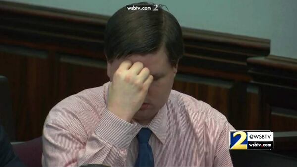 Justin Ross Harris reacts to hearing his ex-wife Leanna Taylor describe how she says Harris ruined her life, during Harris' murder trial at the Glynn County Courthouse in Brunswick, Ga., on Tuesday, Nov. 1, 2016. (screen capture via WSB-TV)