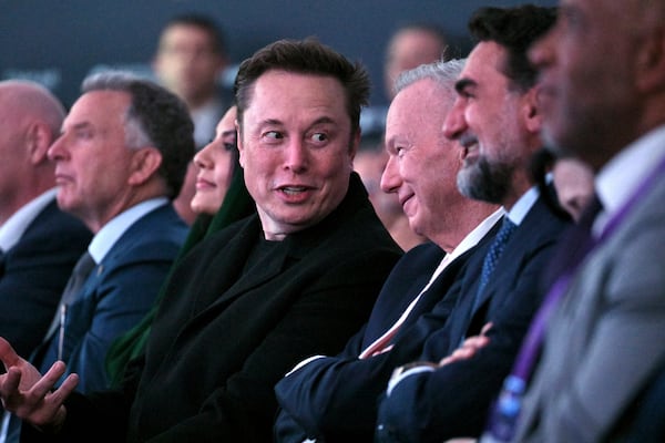 Elon Musk (center) heads the Department of Government Efficiency initiative for the Trump administration.