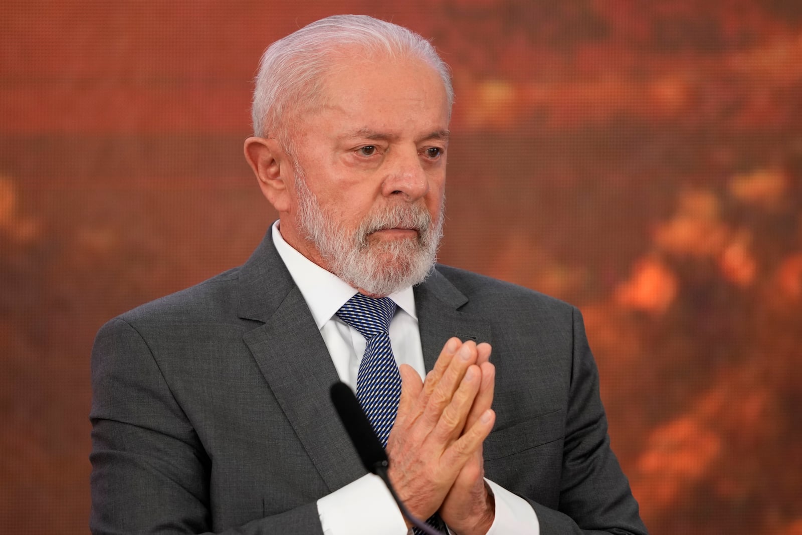 Brazil's President Luiz Inacio Lula da Silva attends a signing ceremony of a compensation agreement for damages caused by the 2015 collapse of the Mariana dam owned by the mining company Samarco, a joint venture of Vale and BHP, at the Planalto Presidential Palace, in Brasilia, Brazil, Friday, Oct. 25, 2024. (AP Photo/Eraldo Peres)