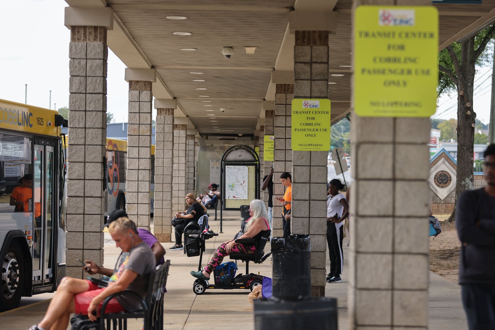 Passengers board the CobbLinc  transit bus at the Marietta Transit Center on Monday, Sept. 23, 2024. (Natrice Miller/ AJC)