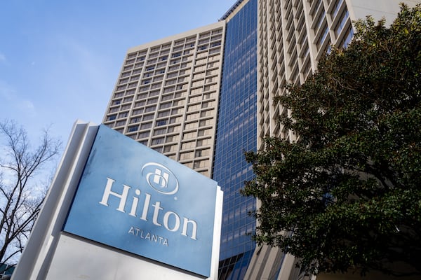 The Hilton Atlanta hotel building stands along Courtland Street in downtown Atlanta, Georgia. Thursday, March 13, 2025 (Ben Hendren for the Atlanta Journal-Constitution)