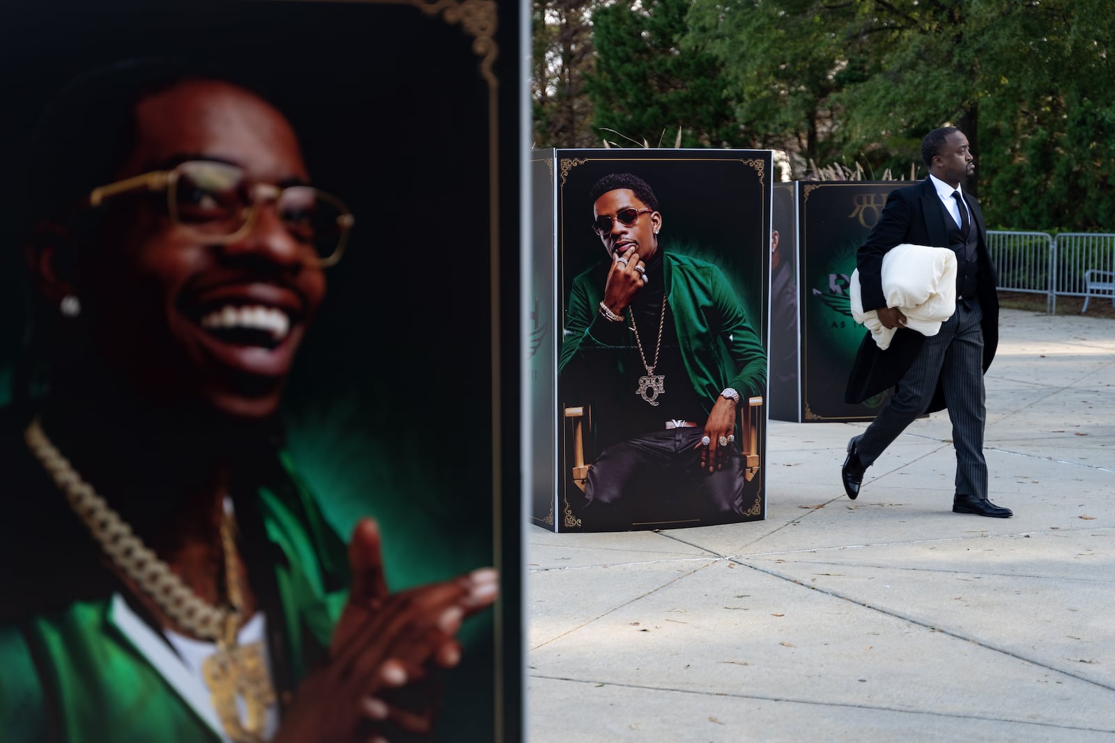 Friends, family and fans gather at World Changers International Church to pay respects to the late rapper Rich Homie Quan on Tuesday, Sept. 17, 2024. (Ben Hendren for the AJC)