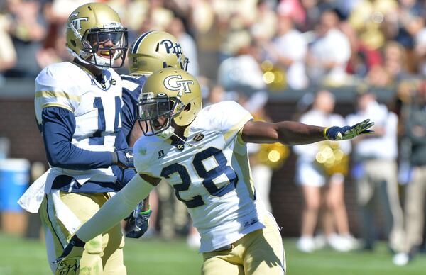 October 17, 2015 Atlanta - Georgia Tech Yellow Jackets defensive back D.J. White (28) celebrates in the first half at Bobby Dodd Stadium on Saturday, October 17, 2015. HYOSUB SHIN / HSHIN@AJC.COMt34