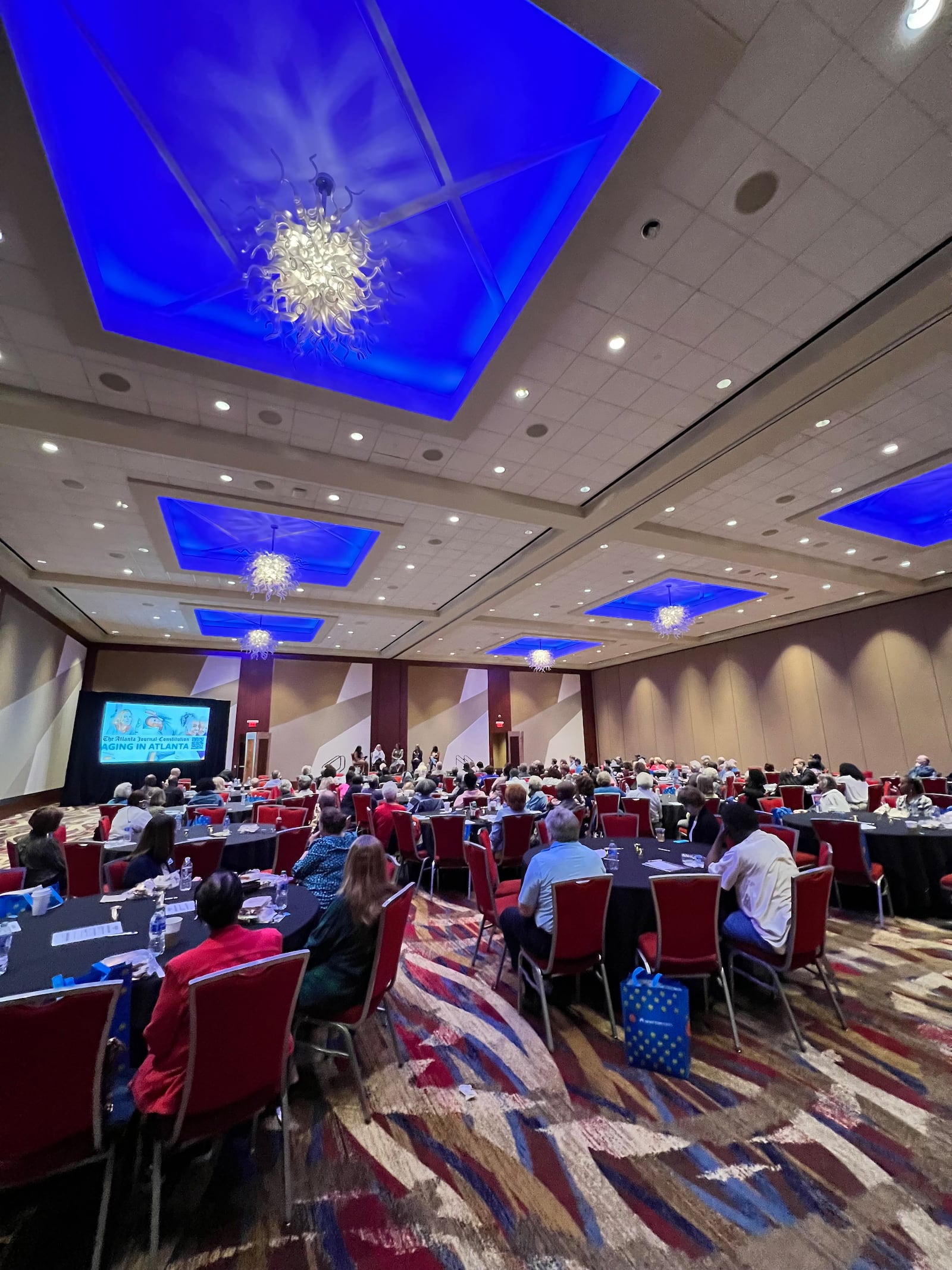 Attendees gathered at Cobb Energy Centre for the Atlanta Journal-Constitution's Aging in Atlanta event on March 28, 2023.