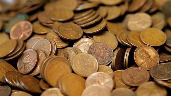 GLENVIEW, IL - JULY 06: Pennies are displayed at Glenview Coin & Collectibles July 6, 2006 in Glenview, Illinois. Reportedly due to manufacturing costs, the US Mint may be contemplating discontinuing the penny.  (Photo by Tim Boyle/Getty Images)