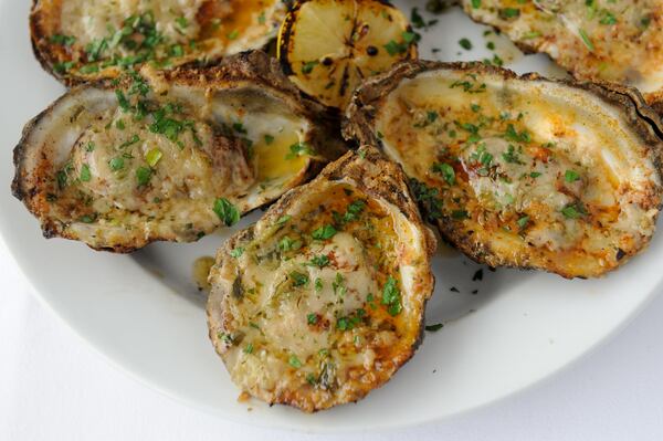  RC's Chargrilled Oysters at Hugo's Oyster Bar. / AJC file photo