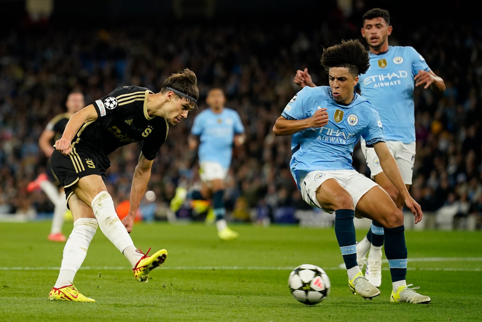 Sparta Praha's Veljko Birmancevic makes an attempt to score during the Champions League opening phase soccer match between Manchester City and Sparta Praha at the Etihad Stadium in Manchester, England, Wednesday, Oct.23 , 2024. (AP Photo/Dave Thompson)