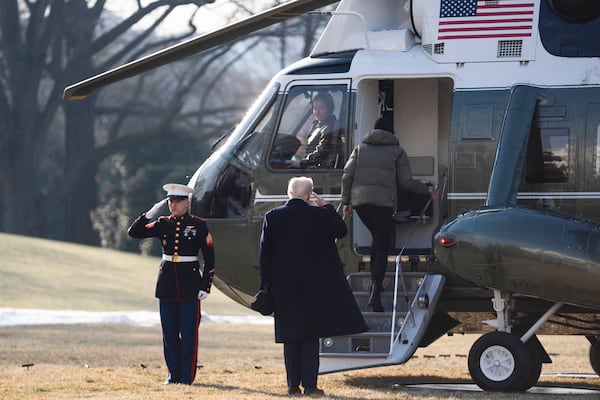 First lady Melania Trump and President Donald Trump board Marine One on the South Lawn of the White House, Friday, Jan. 24, 2025, in Washington. (AP Photo/Evan Vucci)