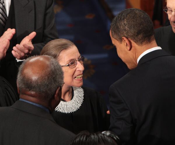 President Barack Obama greets Supreme Court Justice Ruth Bader Ginsburg before he addresses a joint session of Congress in 2009. (George Bridges/MCT/TNS)