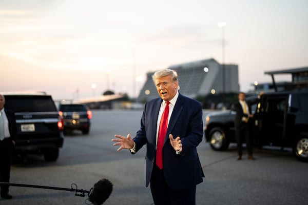 Former President Donald Trump, speaking after he was booked at the Fulton County Jail on charges in an election-interference case, faces a problem if he is convicted of felony charges in that probe or those in three other jurisdictions. Nearly 40% of Republicans who responded to an Atlanta Journal-Constitution poll say they won’t vote for a political candidate convicted by a jury of a felony crime. (Doug Mills/The New York Times)
                      