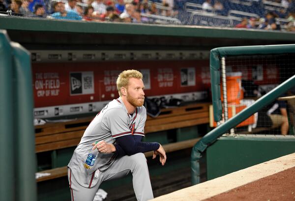 Braves starting pitcher Mike Foltynewicz watches from the dugout during a delay before the game against the Washington Nationals, Thursday, July 6, 2017, in Washington. (AP Photo/Nick Wass)