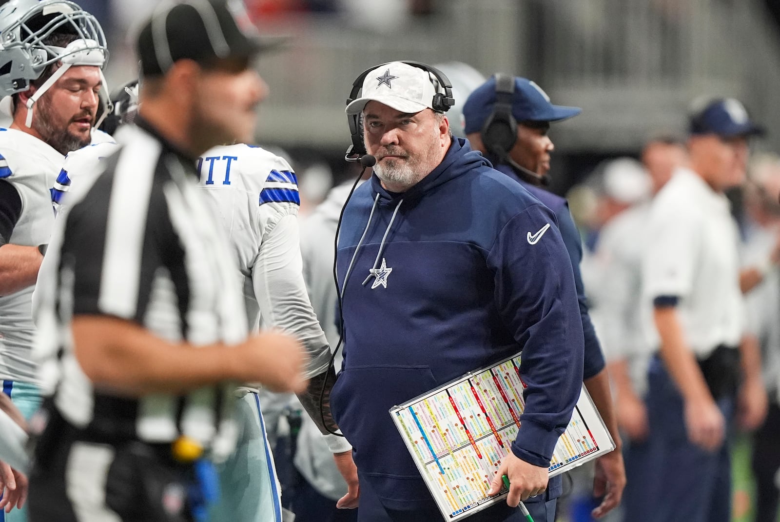 Dallas Cowboys head coach Mike McCarthy walks on the sideline during the second half of an NFL football game against the Atlanta Falcons, Sunday, Nov. 3, 2024, in Atlanta. (AP Photo/ Brynn Anderson)