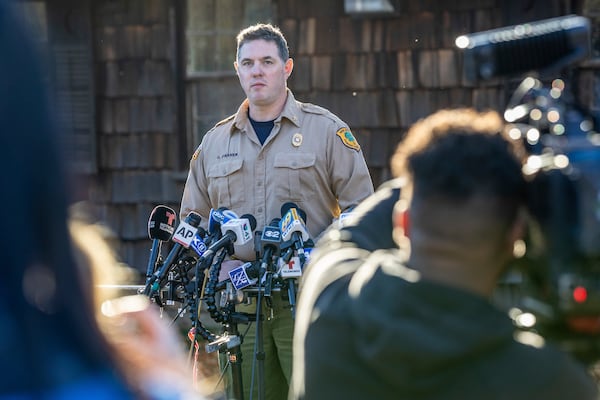 Assistant Division Fire Warden Chris Franek speaks to reporters during a briefing at the New Jersey Forest Fire Service Command Post, Monday, Nov. 11, 2024, in Ringwood, N.J. (AP Photo/Stefan Jeremiah)