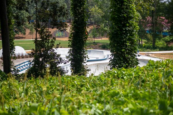 07/26/2021 — Newnan, Georgia —A skate park is under construction at C.J. Smith Park in Newnan, Monday, July 26, 2021. (Alyssa Pointer/Atlanta Journal-Constitution)