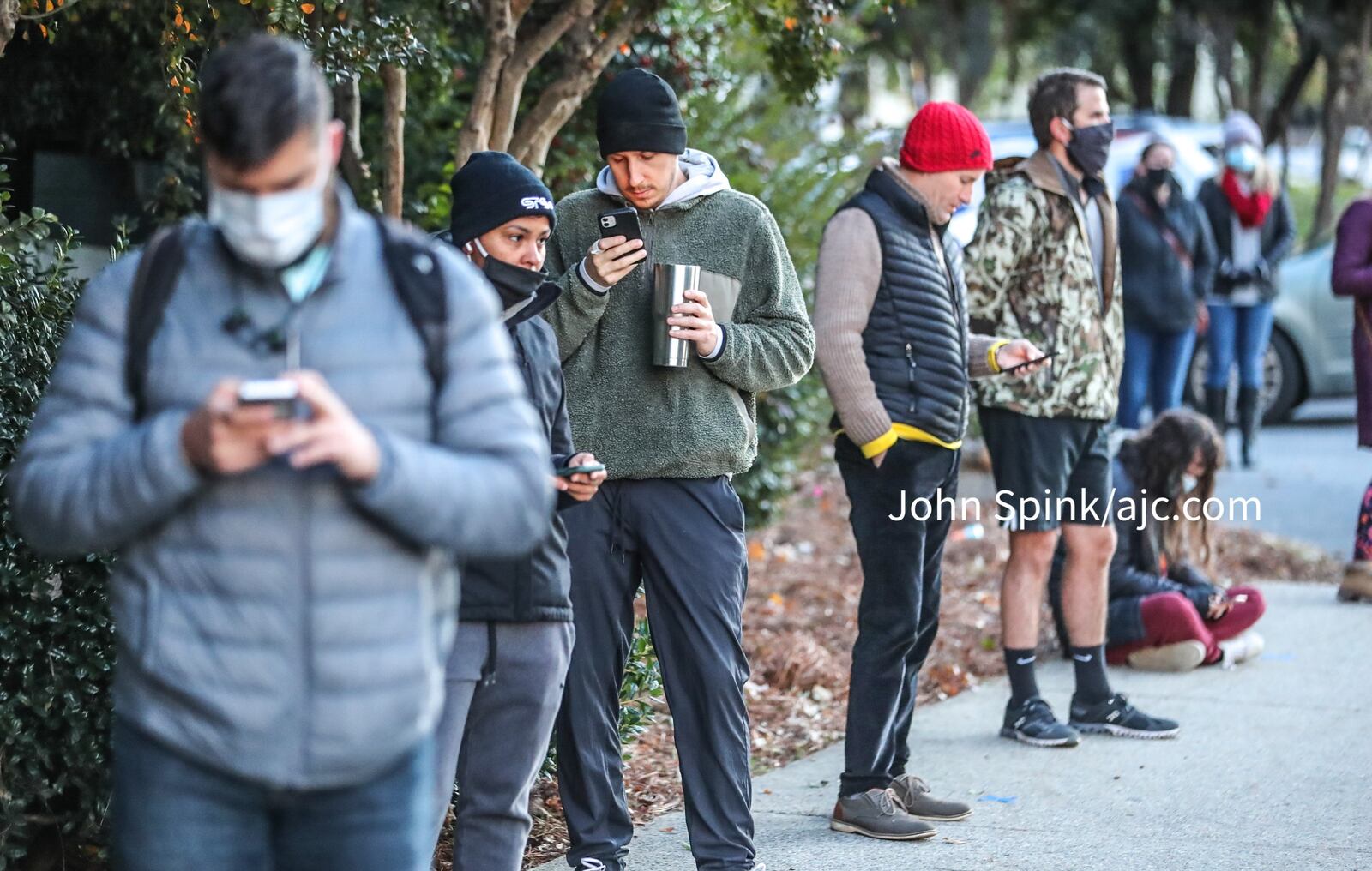 Bundled up voters get in line at Park Tavern in Atlanta on Election Day.