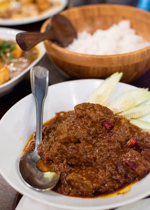 Mamak’s beef rendang has wonderful depth of flavor to match its spiciness. CONTRIBUTED BY HENRI HOLLIS