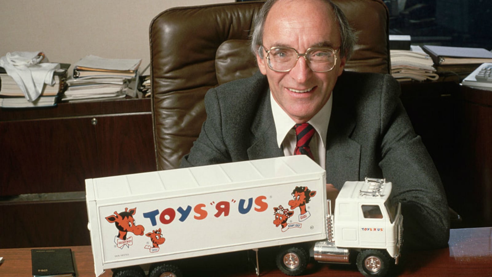 Toys R Us founder Charles Lazarus poses with a toy truck in this undated photo. Company officials announced on Thursday, March 22, 2018, that Lazarus had died. He was 94.