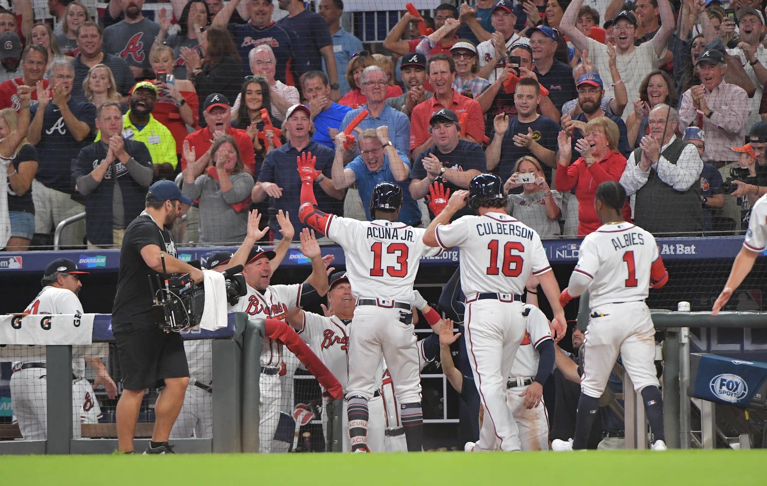 Photos: Acuna hits grand slam as Braves battle Dodgers in Game 3