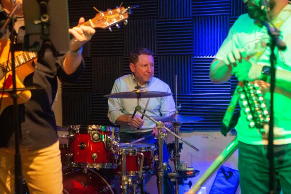 Allan Vella (center), CEO of the Fox Theatre, rehearses on Wednesday, November 30, 2022, in Decatur, Georgia. The 'Dad Band' will open the "It's a Mighty Mo and More" performance on December 20, 2022, at the Fox Theatre. CHRISTINA MATACOTTA FOR THE ATLANTA JOURNAL-CONSTITUTION.