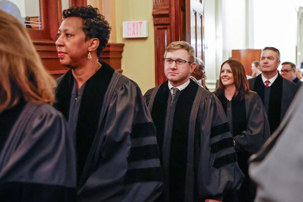 Georgia Supreme Court Chief Justices walk into House chambers for the annual state of the judiciary address on Wednesday, Feb. 7, 2024. Pictured are Justices Verda Colvin and Andrew Pinson,  (Natrice Miller/natrice.miller@ajc.com)