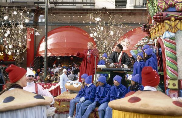 Pictured: (r-l) The Captain and Tenille perform on a gingerbread house float during the 1996 Macy's Thanksgiving Day Parade.