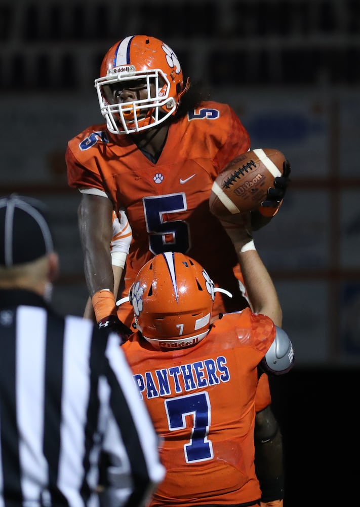 Photos: First round of high school football state playoffs