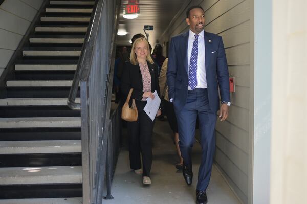 Mayor Andre Dickens takes a tour of The Villages of East Lake alongside Catherine Woodling of The East Lake Foundation on Monday, May 9, 2022. (Natrice Miller / natrice.miller@ajc.com)