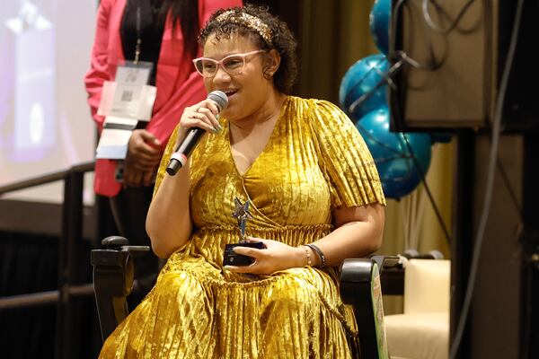 Daphne Frias speaks after receiving an award during the National Youth Employment Coalition’s annual forum in Downtown Atlanta on  Tuesday, March 5, 2024. (Natrice Miller/ Natrice.miller@ajc.com)