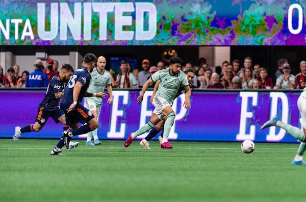 Atlanta United midfielder Marcelino Moreno #10 dribbles the ball during the match against Cincinnati FC at Mercedes-Benz Stadium in Atlanta, United States on Saturday April 16, 2022. (Photo by Dakota Williams/Atlanta United)