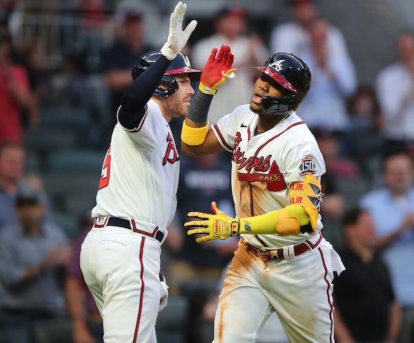 Braves Freddie Freeman (left) and Ronald Acuna lead the NL with 12 home runs apiece.  (Curtis Compton / Curtis.Compton@ajc.com)