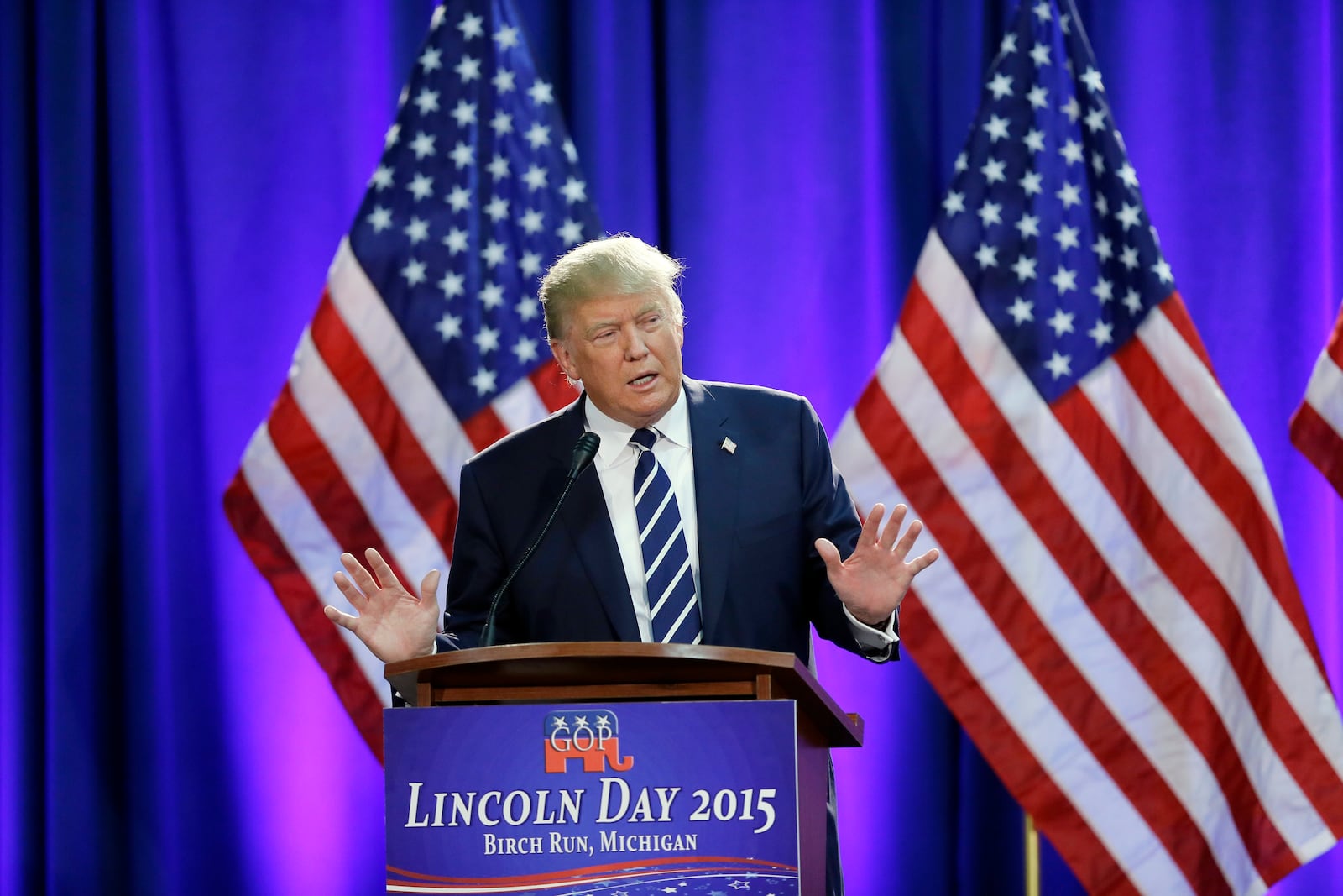 FILE - Republican presidential candidate Donald Trump addresses a GOP fundraising event, Aug 11, 2015, in Birch Run, Mich. (AP Photo/Carlos Osorio, File)