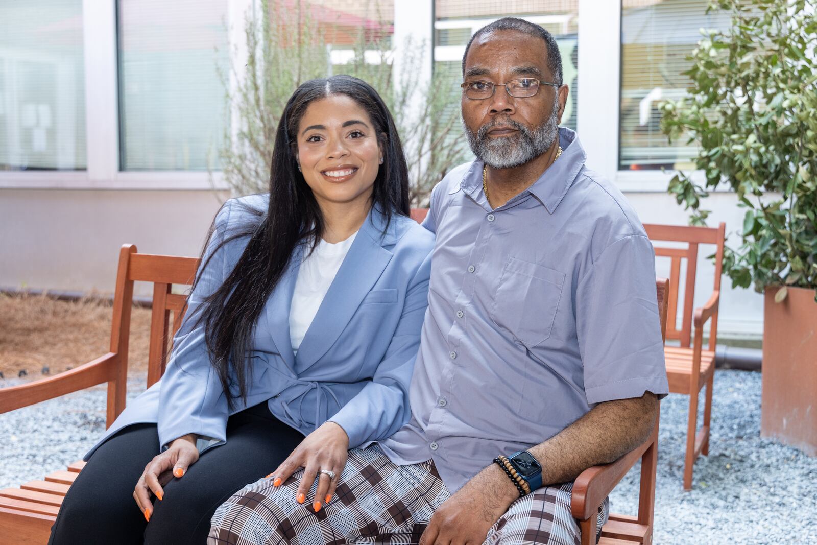 Portrait of Ivy Porter-Henderson with her father Bradley Porter in the Hope House courtyard in Atlanta. 
PHIL SKINNER FOR THE ATLANTA JOURNAL-CONSTITUTION.