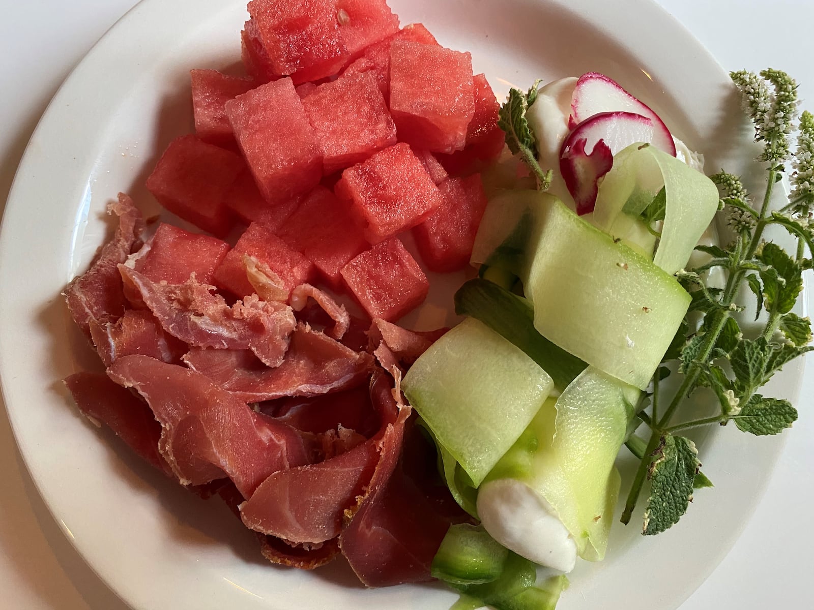 The watermelon salad with country ham and house-made mozzarella at Seven Lamps is a standout. CONTRIBUTED BY BOB TOWNSEND
