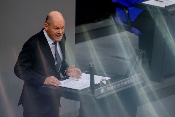 German Chancellor Olaf Scholz speaks during a plenary session at the German parliament Bundestag where he faces a vote of confidence, Berlin, Germany, Monday, Dec. 16, 2024. (AP Photo/Markus Schreiber)