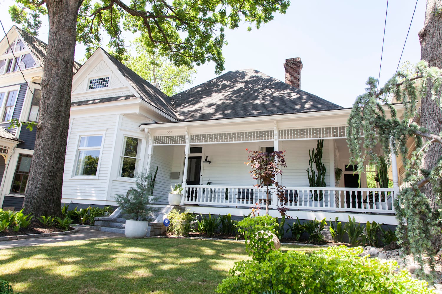 Photos: Grant Park Queen Anne Victorian home’s black-and-white design inspired by Switzerland