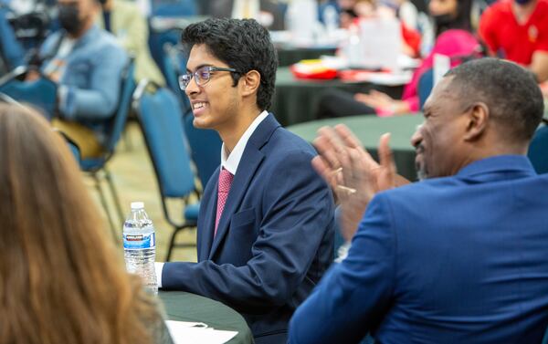 Vinayak Menon is applauded by his fellow speakers during the Voices for Prevention Substance Abuse Prevention Day at the Georgia Capitol event in Atlanta.  PHIL SKINNER FOR THE ATLANTA JOURNAL-CONSTITUTION.